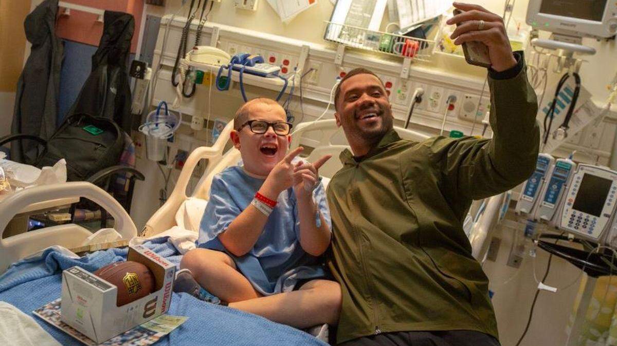 “Kick butt!” That’s what little Mason thinks of Russell Wilson’s weekly visits to Seattle Children’s hospital. The Seahawks quarterback’s been doing it since his first months in the NFL and in Seattle. That was nine years ago. They are acts far more important than fourth-quarter comebacks and football wins.