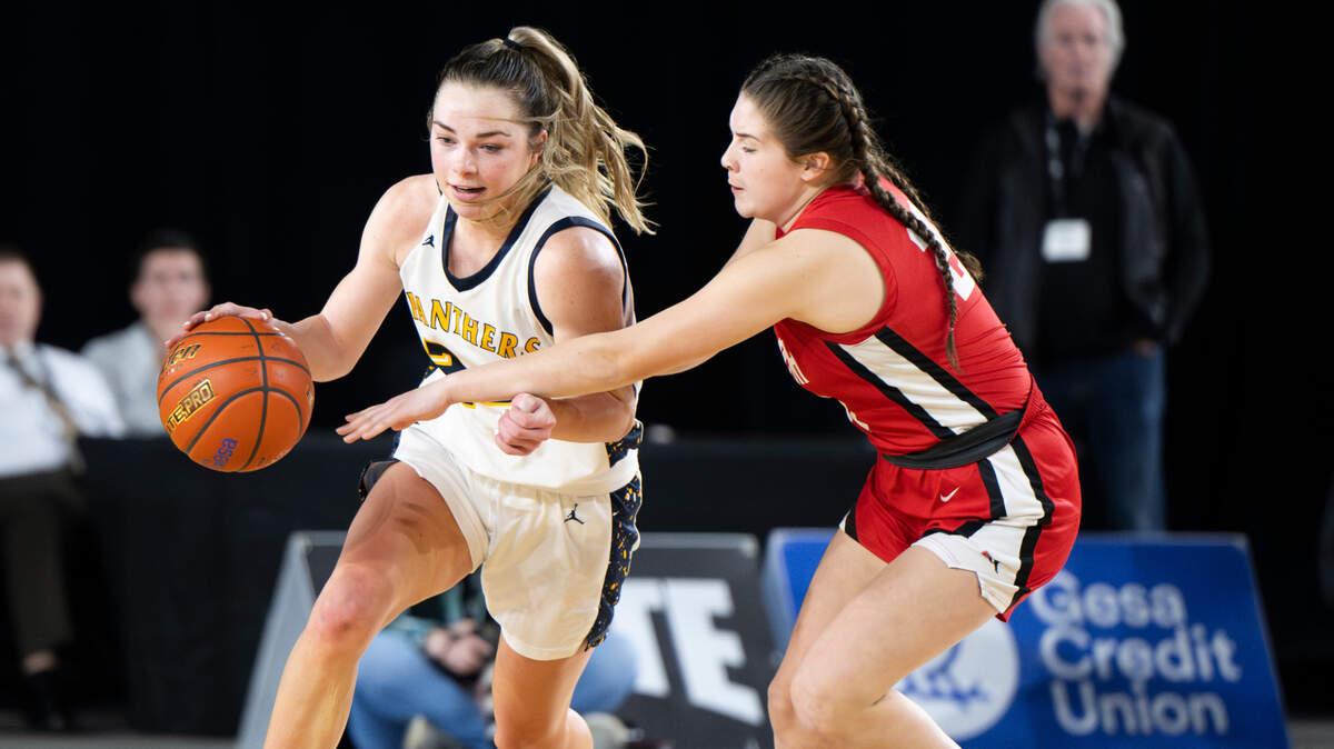 Mead’s Teryn Gardner (24) is fouled by Snohomish’s Danica Avalos (20) during the semifinals game of the Class 3A state tournament at the Tacoma Dome, on Friday, March 1, 2024, in Tacoma, Wash.