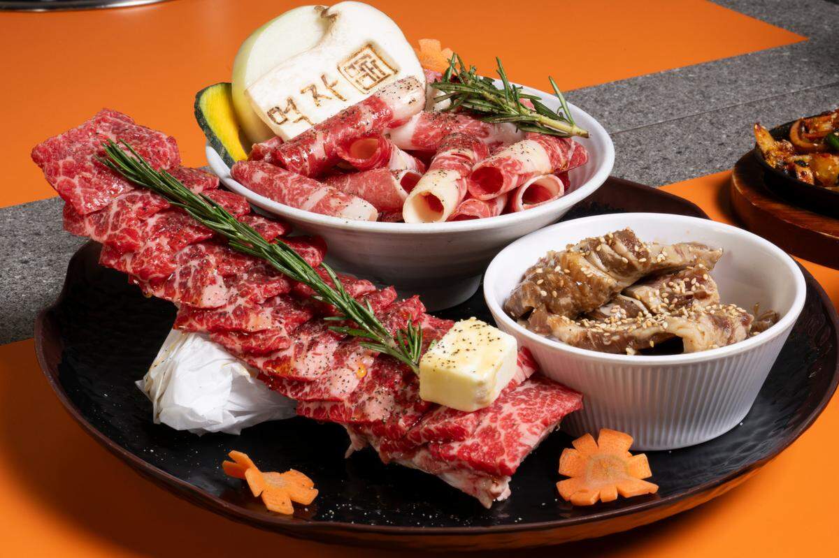 A Mukja Beef Combo, or Combo C, sits on a table at Mukja Korean BBQ on Friday, April 18, 2025, in Puyallup, Wash. The combination of meats, which includes boneless short rib, beef brisket and LA-style galbi, comes with rice, salad, side dishes and kimchi or soybean stew.