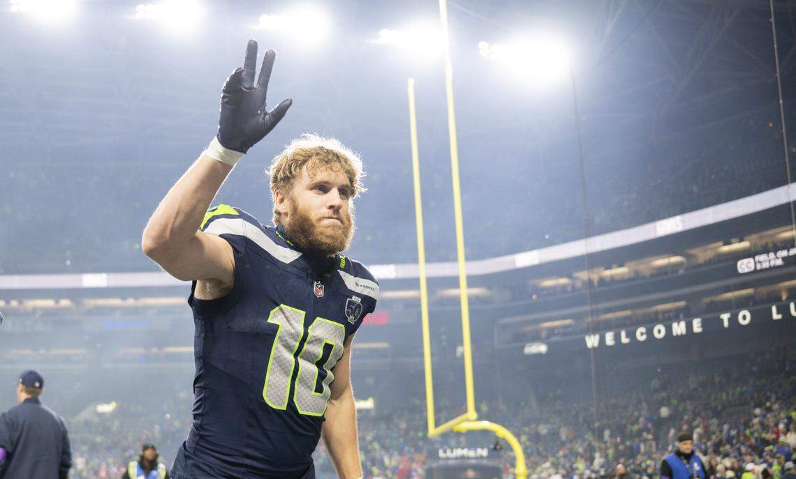 Seattle Seahawks wide receiver Cooper Kupp (10) waves to fans after the Seattle Seahawks 41-6 victory against the San Francisco 49ers the NFC Divisional Round game at Lumen Field, on Saturday, Jan. 17, 2026, in Seattle.