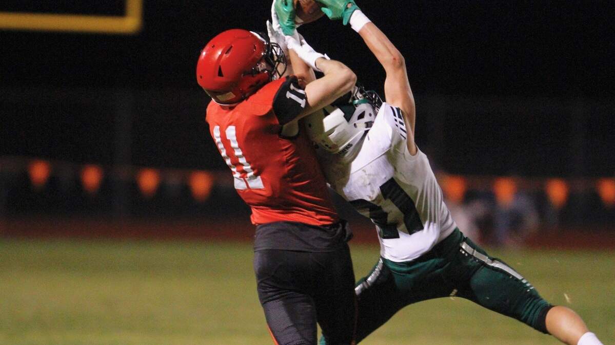 Peninsula corner Jude Endsley, right, had two interceptions in Yelm’s 42-21 over Peninsula on Friday, Oct. 12, 2018 at Yelm High School.