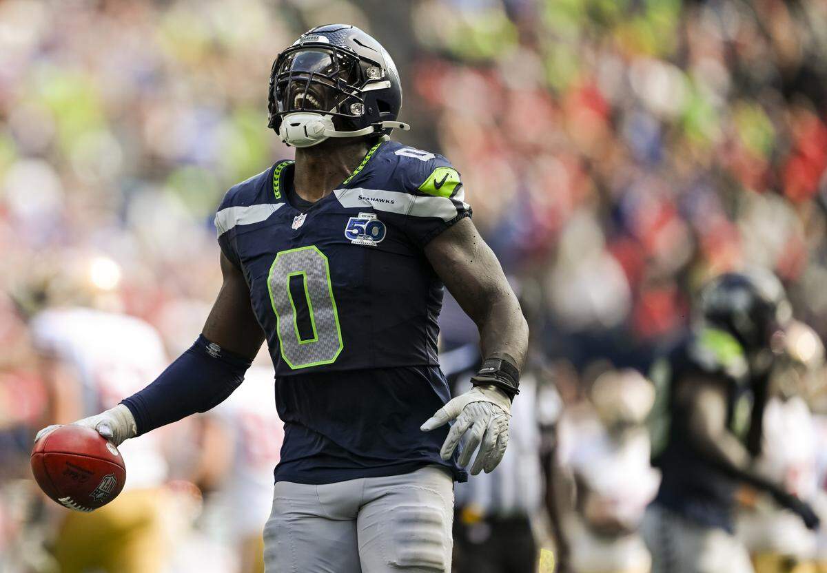 Seattle Seahawks defensive end DeMarcus Lawrence (0) reacts to recovering the ball on a blocked field goal against the San Francisco 49ers during the third quarter of the game at Lumen Field, on Sunday, Sept. 7, 2025, in Seattle.