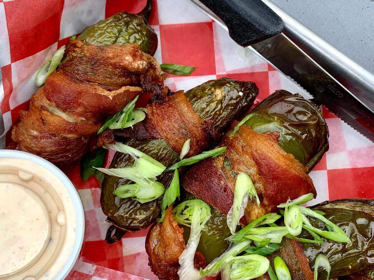 Order some jalapeno poppers for the table while watching the Mariners games at Ale House Pub in UP.