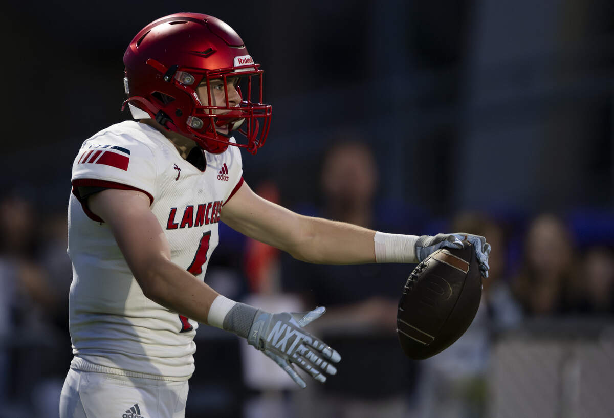Kennedy Catholic defensive back Jayce Fitzgerald (4) reacts to an interception in the end zone against the Sumner Spartans during the first half of the game at Sunset Chev Stadium on Friday, Sept. 12, 2025, in Sumner, Wash.