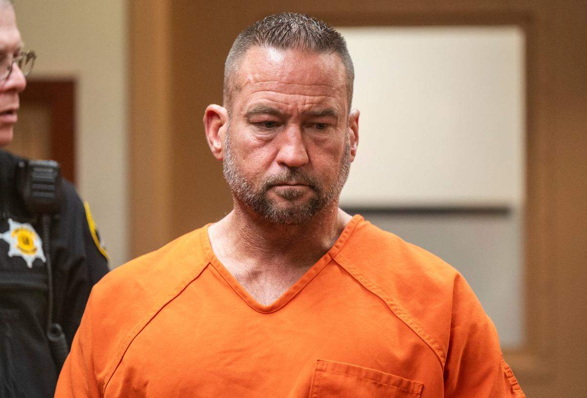 Robert Glen Carpenter, a former Pierce County sheriff’s sergeant, appears in court for his arraignment after being charged with first-degree kidnapping, three counts of second-degree assault and felony harassment regarding a domestic-violence incident that allegedly involved the defendant strangling his girlfriend to near unconsciousness and threatening her with a machete after he came home drunk, at Pierce County Superior Court in Tacoma, Wash. on Nov. 15, 2022.