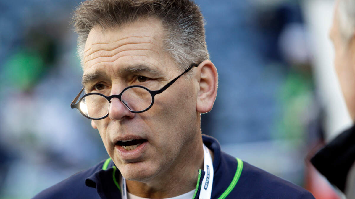 Former Seattle Seahawks quarterback Jim Zorn stands on the sidelines before the start of an NFL football game between the Seattle Seahawks and the San Francisco 49ers, Sunday, Dec. 14, 2014, in Seattle. (AP Photo/John Froschauer)