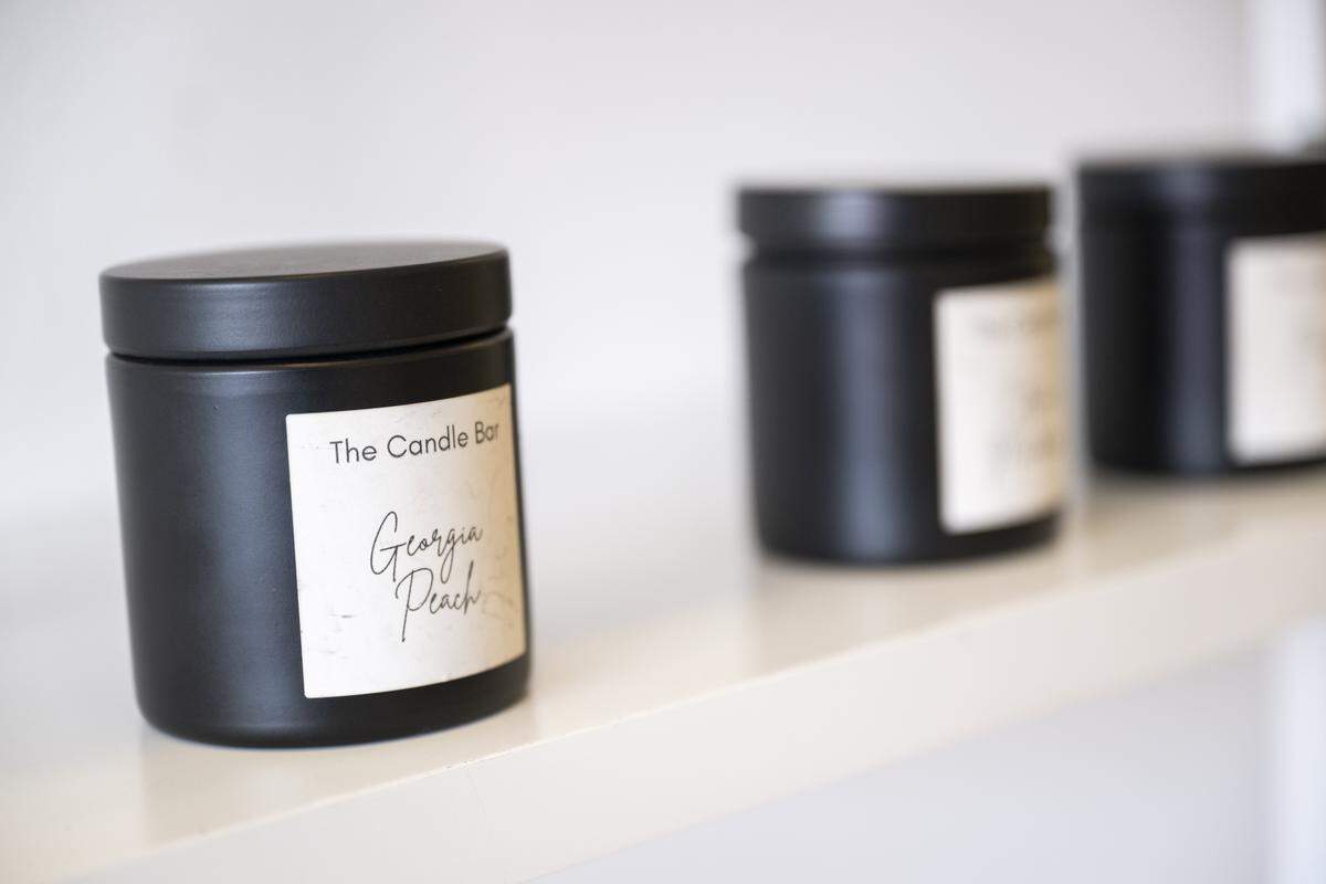 Heather Powloski and Caitlynn Mattson, the mother-daughter owners of The Candle Bar, faced tough times as rising costs and decreased foot traffic impacted their business, on Tuesday, Oct. 7, 2025, in Puyallup, Wash.