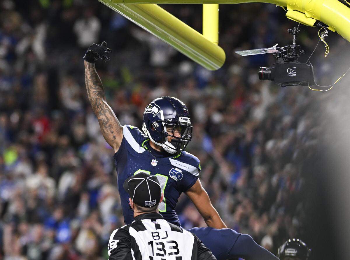 Seattle Seahawks wide receiver Jaxon Smith-Njigba (11) celebrates his touchdown during the first quarter against the Houston Texans of the game at Lumen Field, on Monday, Oct. 20, 2025, in Seattle.