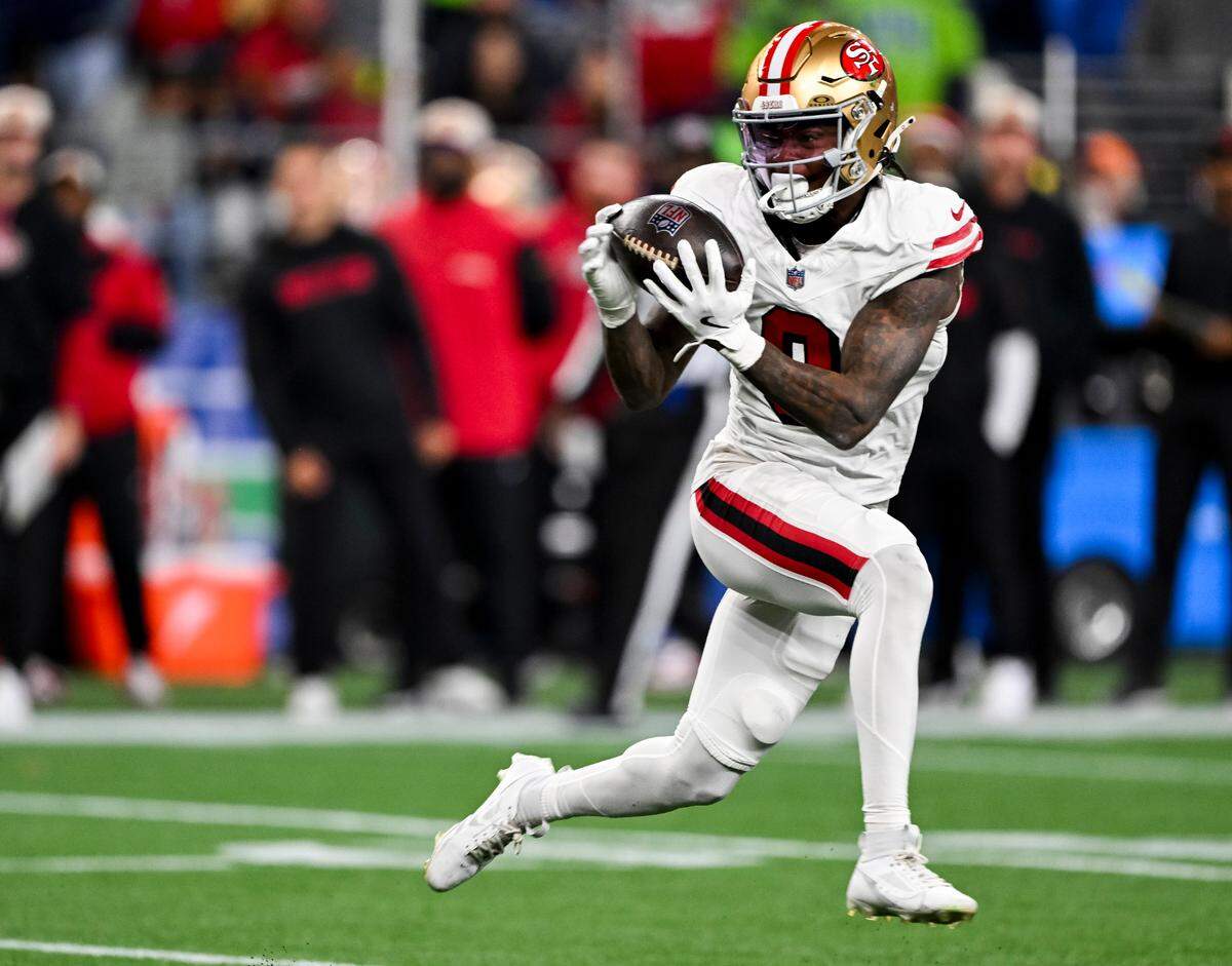 San Francisco 49ers cornerback Renardo Green (0) intercepts a Geno Smith pass intended for Seahawks wide receiver DK Metcalf (14) during the fourth quarter of Seattle’s lost to the 49ers at Lumen Field in Seattle Thursday, Oct. 10, 2024.