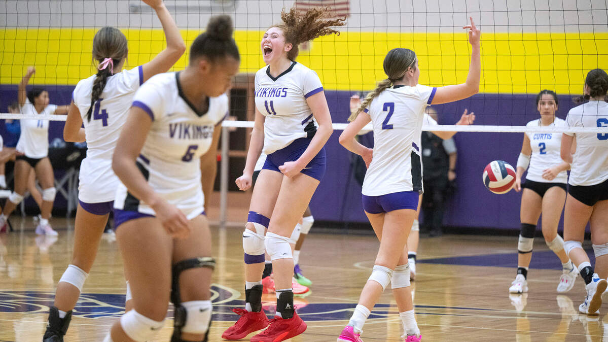 Puyallup’s Rylie Hangca (from left), Rebecca Wilber, Dani Brown and Reese Sheppard celebrate as the Vikings come back in the fourth set agains the Curtis Vikings in Monday night’s 4A SPSL volleyball match at Puyallup High School in Puyallup, Washington, on Oct. 16, 2023. Puyallup won the match in four sets.