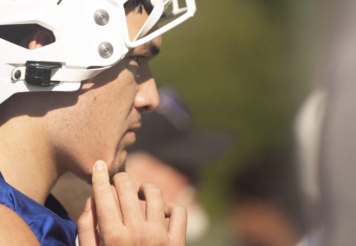 Graham-Kapowsin offensive lineman Ayden Bullinger looks on during a football practice at Graham-Kapowsin High School on Friday, Aug. 22, 2025, in Graham, Wash.