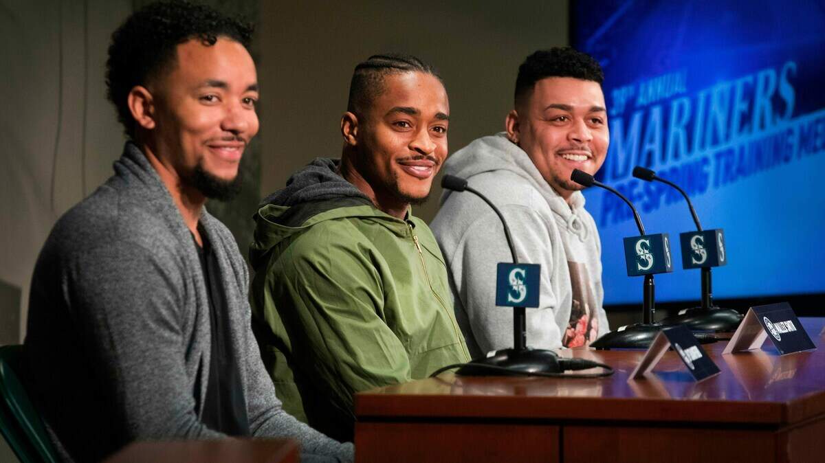 New Seattle Mariners players; from left, infielder JP Crawford, outfielder Mallex Smith and pitcher Justus Sheffield meet the media during the annual pre-spring training media event, Thursday, Jan. 24, 2019 in Seattle. (Steve Ringman/The Seattle Times via AP)