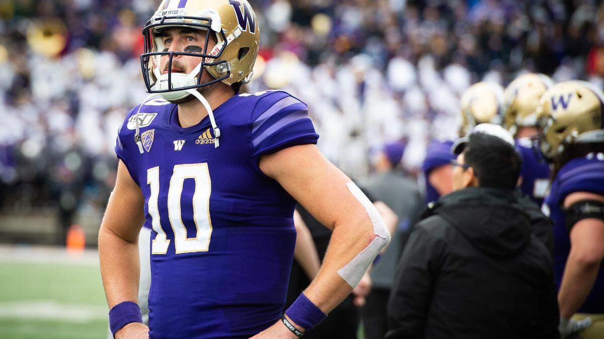 Washington Huskies quarterback Jacob Eason (10) watches as time expires on Oregon’s 35-31 win over Washington. The Washington Huskies played the Oregon Ducks in a NCAA football game at Husky Stadium in Seattle, Wash., on Saturday, Oct. 19, 2019.