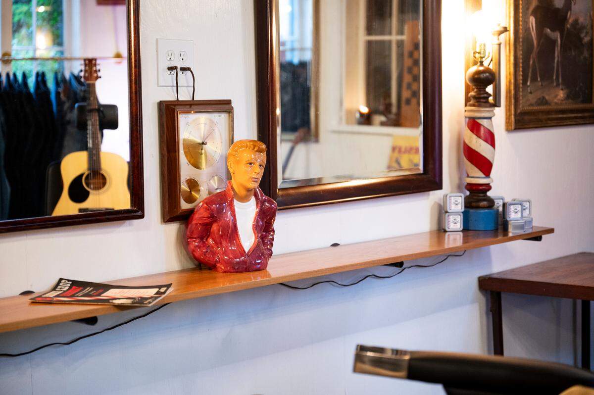 The new speakeasy barbershop in the back of One:11 has everything the modern man needs: clothes, grooming supplies and a cut and shave.