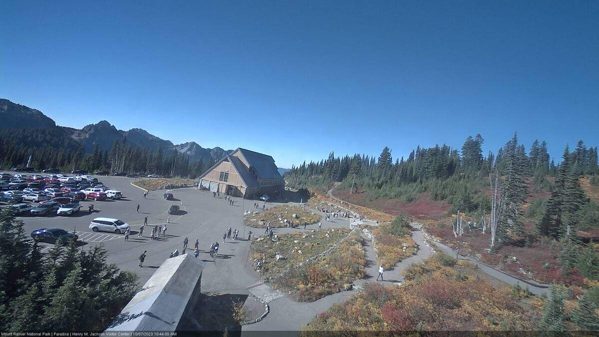The Jackson Visitor Center webcam at Mount Rainier National Park showed visitors taking advantage of one of the last sunny days in the region for awhile. Rain is set to return Monday.