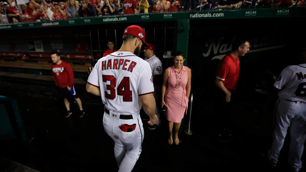 Washington Nationals Bryce Harper (34) leaves the field as the Nationals ended their last home game of the season with a 9-3 rain delayed win against the Miami Marlins in Washington, Wednesday, Sept. 26, 2018. (AP Photo/Manuel Balce Ceneta)