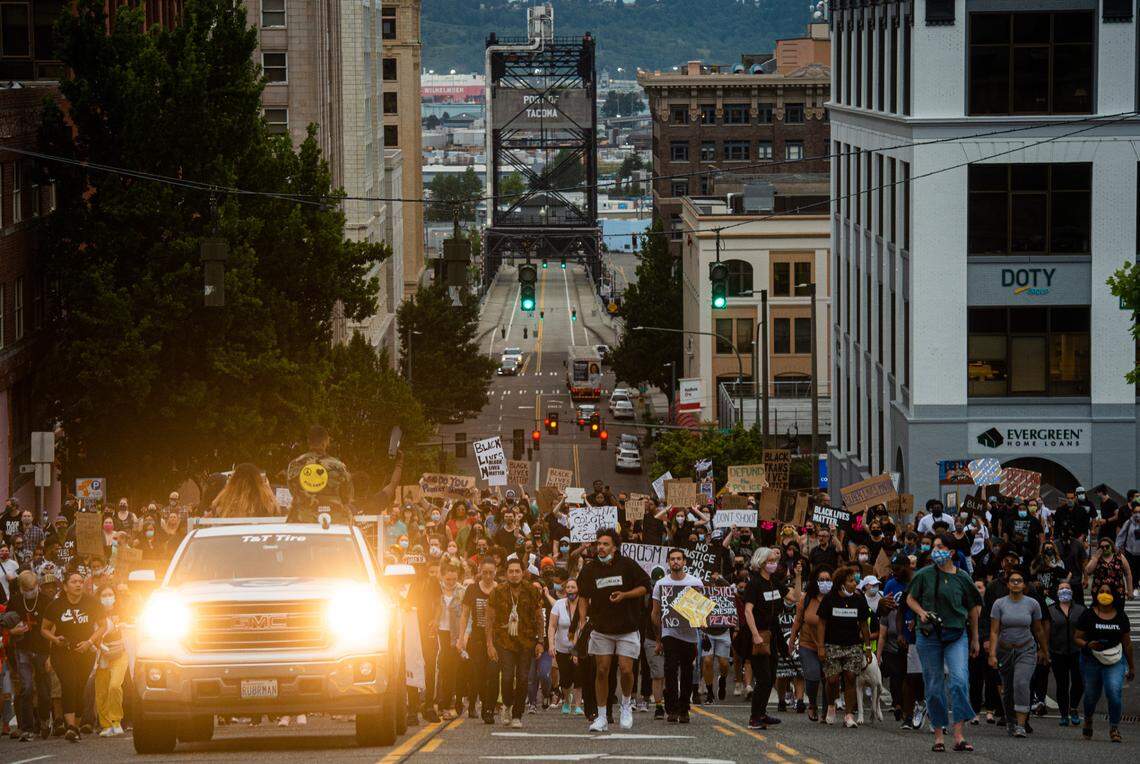 Hundreds marched and listened to speakers at various stops during the Juneteenth march led by Legally Black through Tacoma on Friday, June 19, 2020.