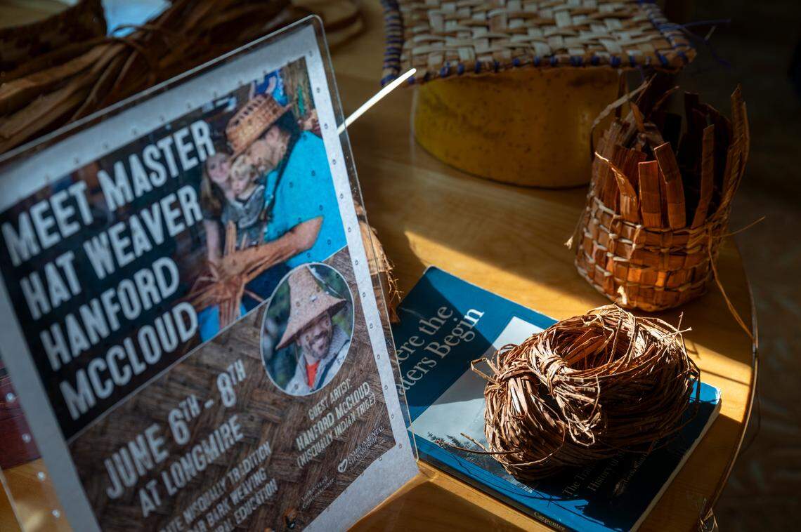 Signs and other materials for a demonstration from Hweqwidi Hanford McCloud, a Nisqually tribal member and a liaison for the Nisqually Tribal Council, on his insights as a master weaver sit on display at the National Park Inn on Friday, June 6, 2025, at Mount Rainier National Park.