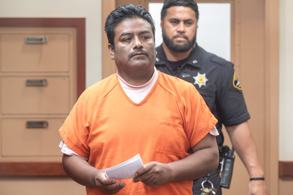 Miguel Angel Urbano-Vazquez, 48, enters court for his arraignment for the 2002 murder and rape of 39-year-old Sharon Van Gilder on Friday, May 16, 2025, at Pierce County Superior Court in Tacoma, Wash. Urbano-Vazquez is charged with aggravated first-degree murder, two counts of first-degree rape and second-degree rape, and was recently extradited to the United States after being arrested in Mexico in 2023.