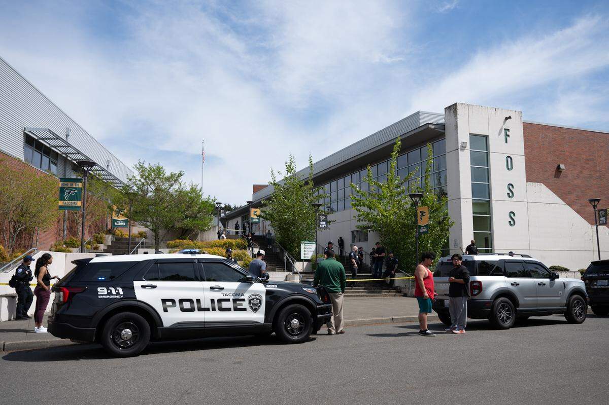 Police remain at Foss High School after six people were injured in a stabbing attack on Thursday, April 30, 2026, in Tacoma, Wash.