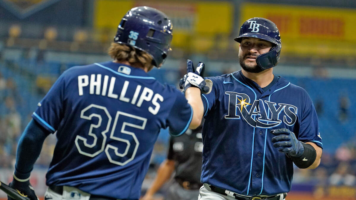 Tampa Bay Rays’ Mike Zunino, right, celebrates with Brett Phillips after his solo home run off Seattle Mariners relief pitcher Drew Steckenrider during the sixth inning of a baseball game Wednesday, Aug. 4, 2021, in St. Petersburg, Fla. (AP Photo/Chris O’Meara)