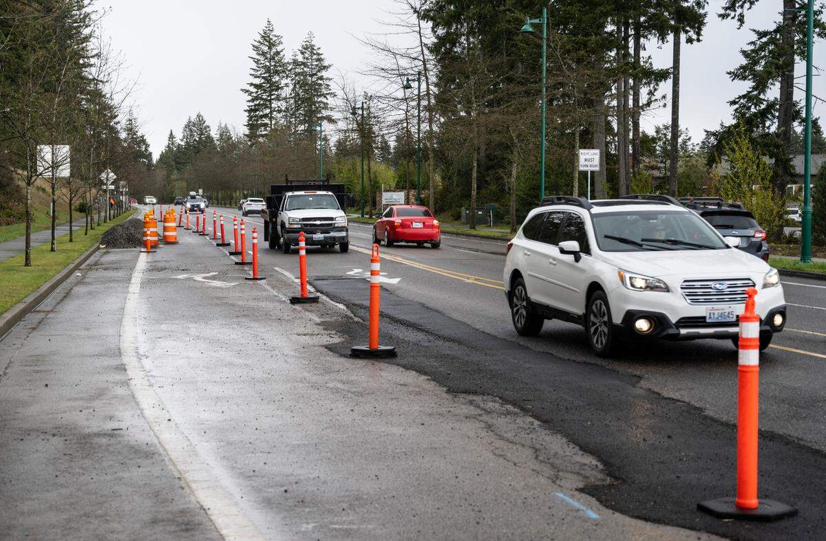 The westbound lane is closed on Borgen Boulevard near Olympus Way for emergency work to repair a pretty dramatic pavement failure on Friday, April 8, 2022 in Gig Harbor, Wash.