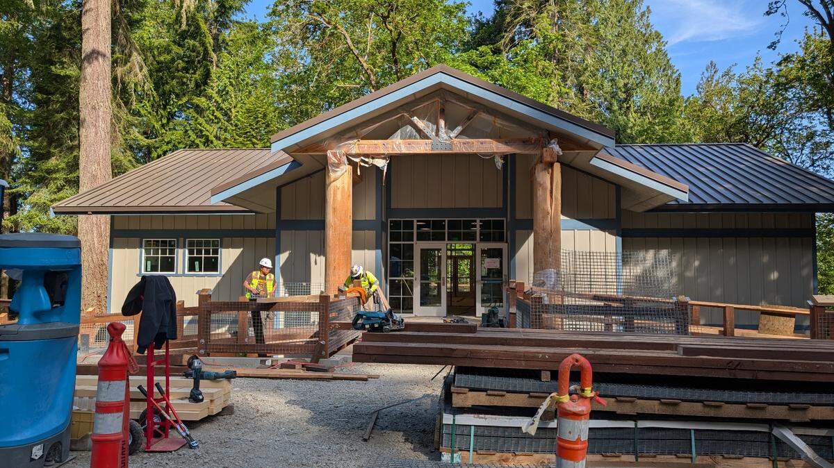 Construction workers build the community center at Kopachuck State Park on May 8, 2025. The park has been closed for a year during a $10 million renovation project. Officials expect to reopen it in August.
