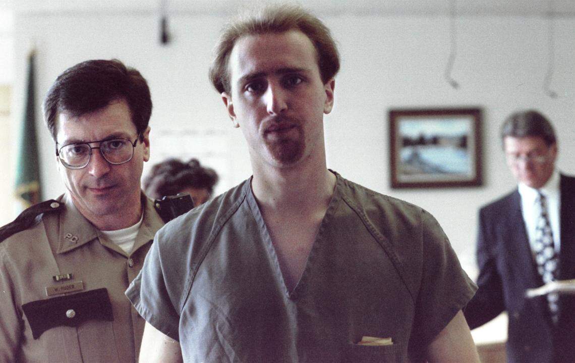 Randy Phillip Capps is lead out of Pierce County Court by a sheriff’s deputy after being arraigned in May 1994 in the murder of Marietta Dela Cruz of Sumner.