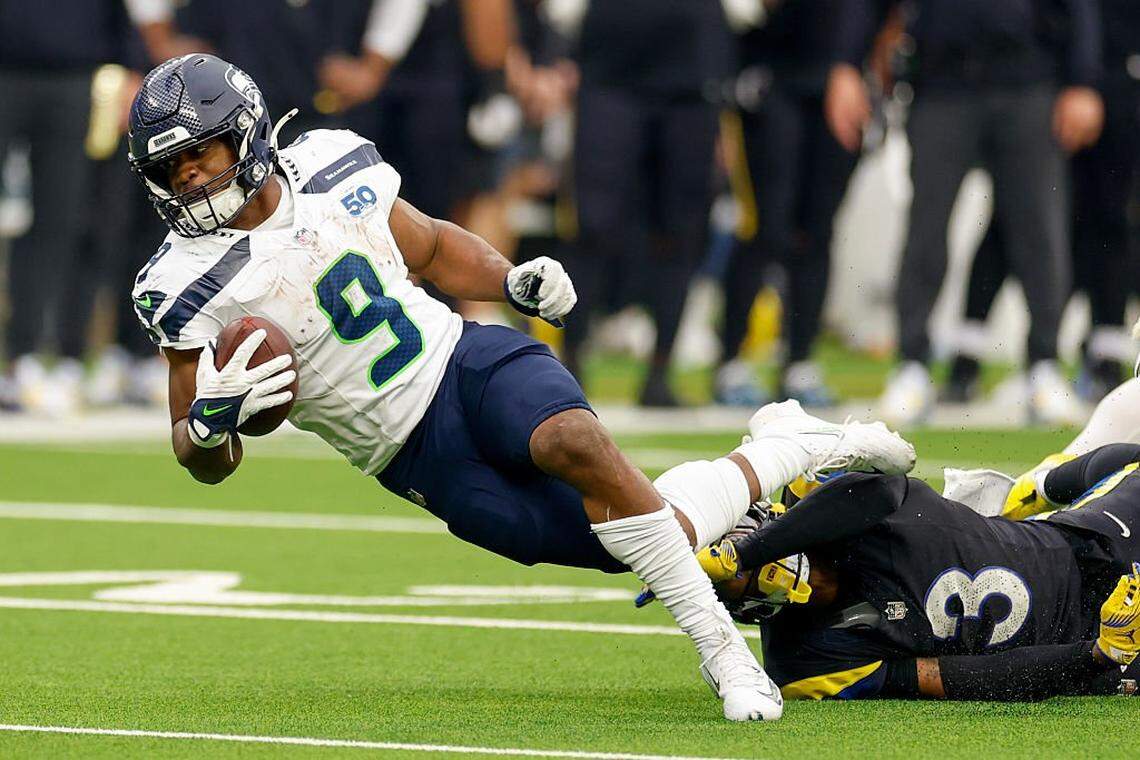 Los Angeles Rams safety Kam Curl (3) tackles Seattle Seahawks running back Kenneth Walker III (9) during the third quarter at SoFi Stadium on November 16, 2025 in Inglewood, California. (Photo by Harry How/Getty Images)