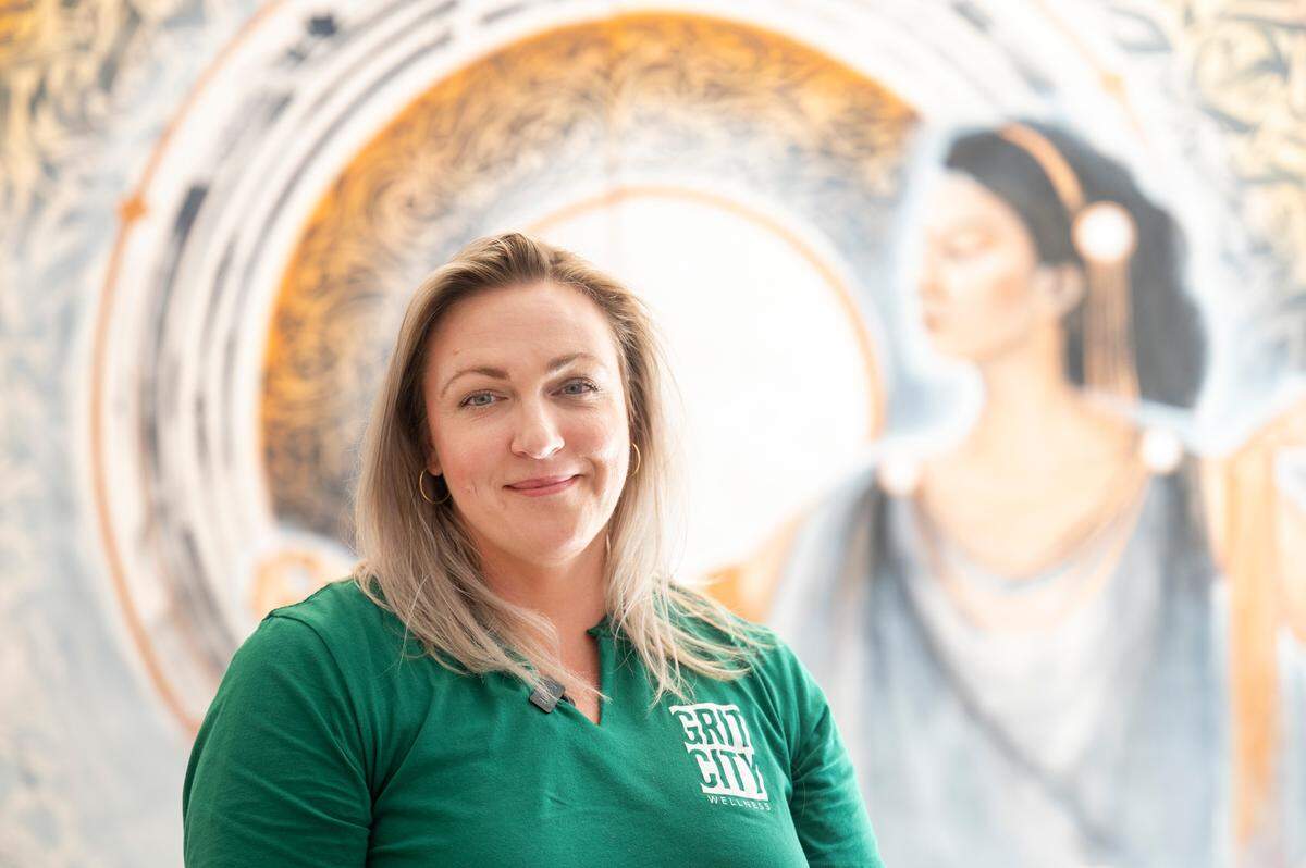 Chyna Willman, owner and founder of Grit City Wellness, poses for a portrait in the yoga studio at her facility in Point Ruston on Friday, July 22, 2022, in Tacoma, Wash.