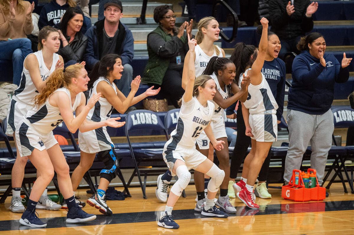 Bellarmine Prep players celebrate a point from the bench during the fourth quarter. Bellarmine Prep played Curtis in a basketball game at Bellarmine Prep in Tacoma, Wash., on Friday, Jan. 17, 2020.