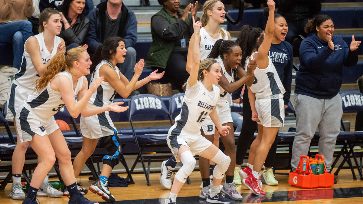 Bellarmine Prep players celebrate a point from the bench during the fourth quarter. Bellarmine Prep played Curtis in a basketball game at Bellarmine Prep in Tacoma, Wash., on Friday, Jan. 17, 2020.