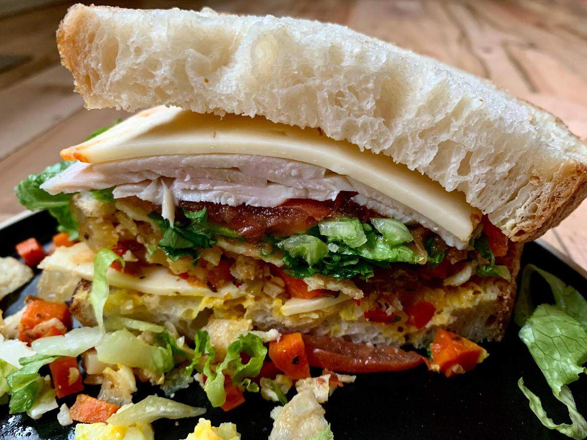 In the basement of Courthouse Square, Outpost Sandwiches churns out a short but solid menu of deli sandwiches with housemade touches like roasted tomatoes and herbaceous aioli on Macrina sourdough. The Hero boasts giardiniera, a pickled condiment of cauliflower, carrot and pepper.