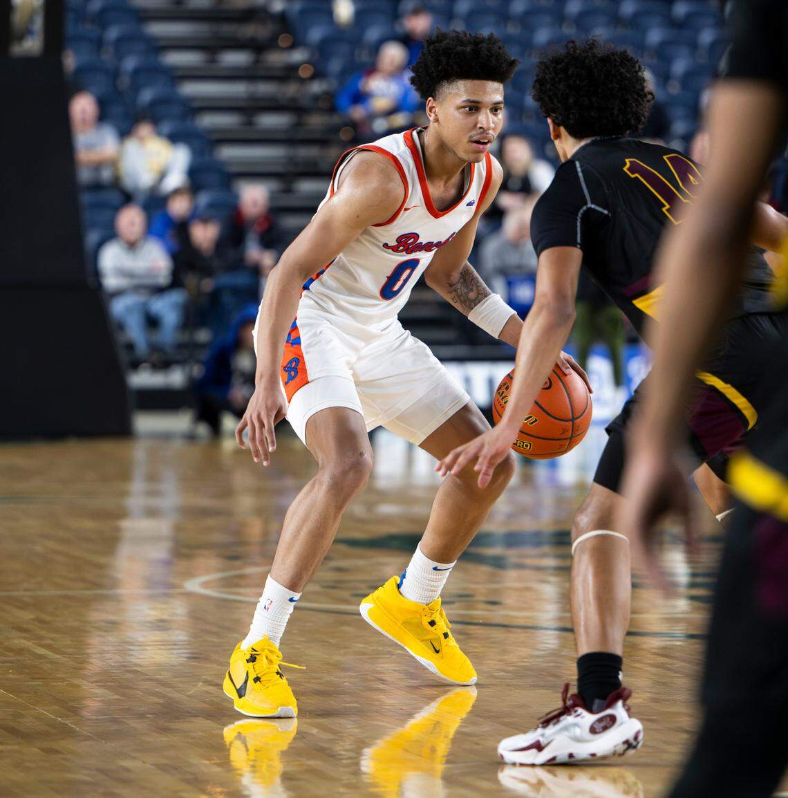 Rainier Beach’s Kaden Powers (0) dribbles down the court against O’Dea during the semifinals game of the Class 4A state tournament at the Tacoma Dome, on Friday, March 1, 2024, in Tacoma, Wash.