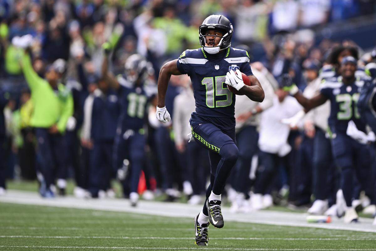 Seattle Seahawks wide receiver Tory Horton (15) runs back a 95-yard touchdown for a touchdown during the first quarter of the game against the New Orleans Saints at Lumen Field, on Sunday, Sept. 21, 2025 in Seattle.