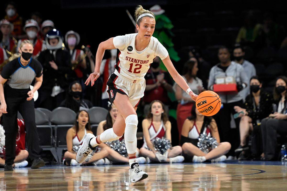 Stanford guard Lexie Hull (12) brings the ball up court against Oregon State during an NCAA college basketball game in the quarterfinals of the Pac-12 women’s tournament Thursday, March 3, 2022, in Las Vegas. (AP Photo/David Becker)