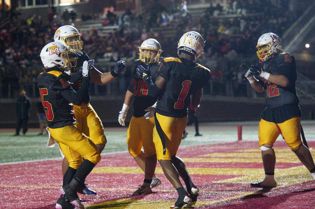 Mount Tahoma players dance in the end zone in celebration of a touchdown by Mount Tahoma’s Elijah Durr (1) against Bellarmine on Friday, Oct. 10, 2025, at Mount Tahoma in Tacoma.
