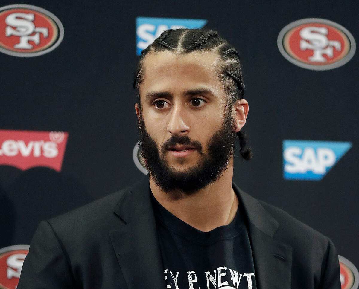 FILE - This Jan. 1, 2017, file photo shows then San Francisco 49ers quarterback Colin Kaepernick speaking at a news conference after the team’s NFL football game against the Seattle Seahawks in Santa Clara, Calif. Pete Carroll said the Seattle Seahawks have not closed the door on the possibility of adding Kaepernick to their roster, but how much further they pursue it may depend on the upcoming NFL draft. Reports surfaced earlier this month that Seattle pulled out of a planned workout for Kaepernick. Seattle has been one of the few teams to show interest in Kaepernick following his protests during the national anthem. (AP Photo/Marcio Jose Sanchez, File)