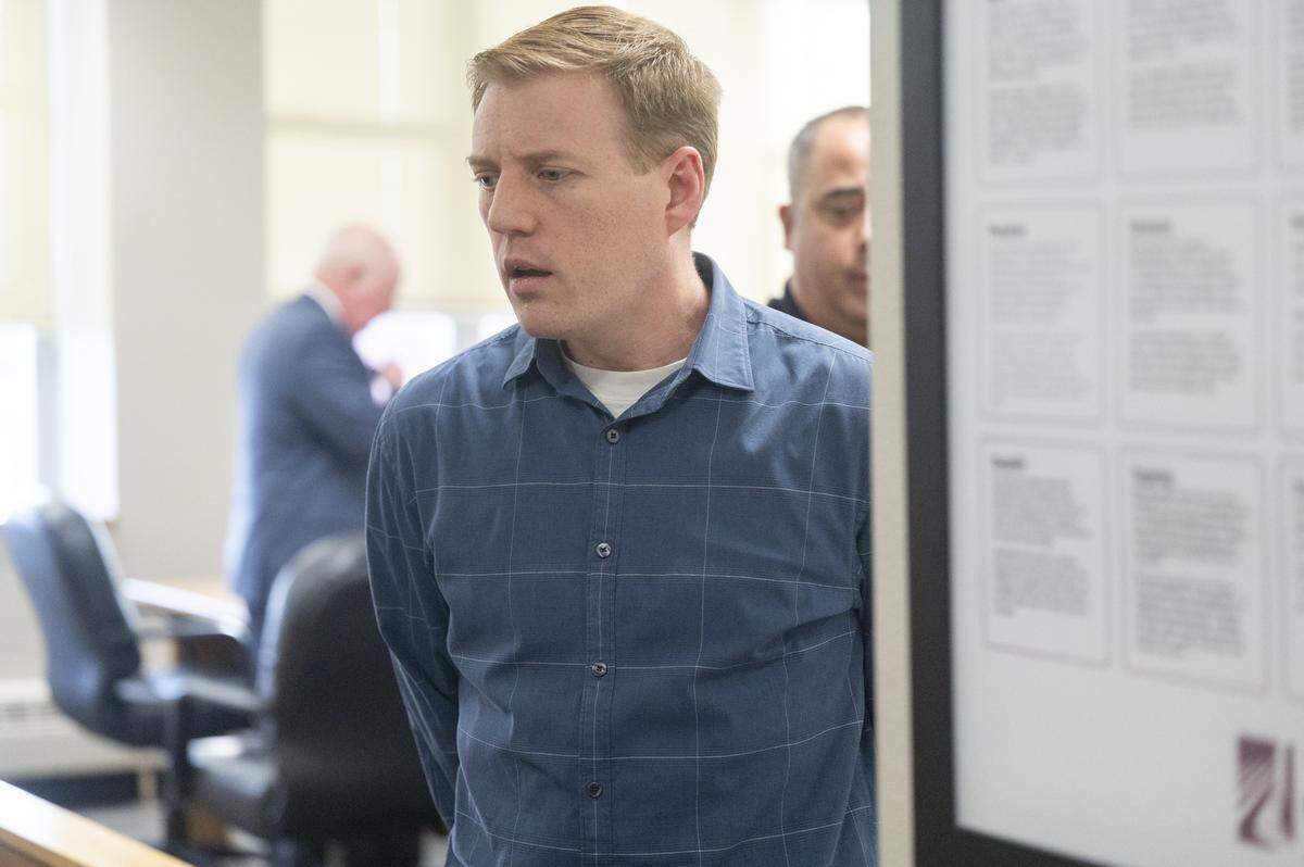 Jordan Henderson is walked out of the courtroom after being found guilty of molesting four former Peninsula School District students on Monday, Jan. 5, 2026, at Pierce County Superior Court in Tacoma. The jury found Henderson guilty on all but one of 13 counts of first-degree child molestation.