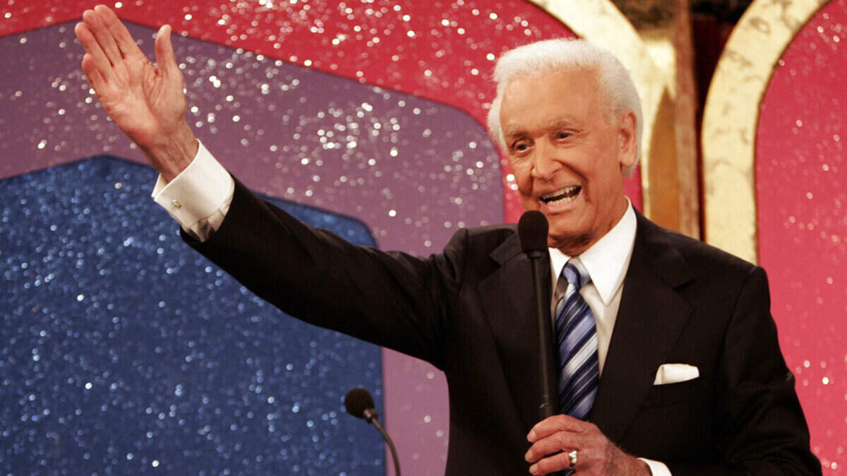 FILE - In this June 6, 2007 file photo, legendary game show host Bob Barker waves goodbye as he tapes his final episode of “The Price Is Right” in Los Angeles. (AP Photo/Damian Dovarganes, File)