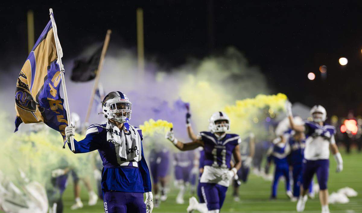 Sumner Spartans take to the field before the game against Eastmont, at Sunset Chev Stadium on Friday, Nov. 7, 2025, in Sumner, Wash.