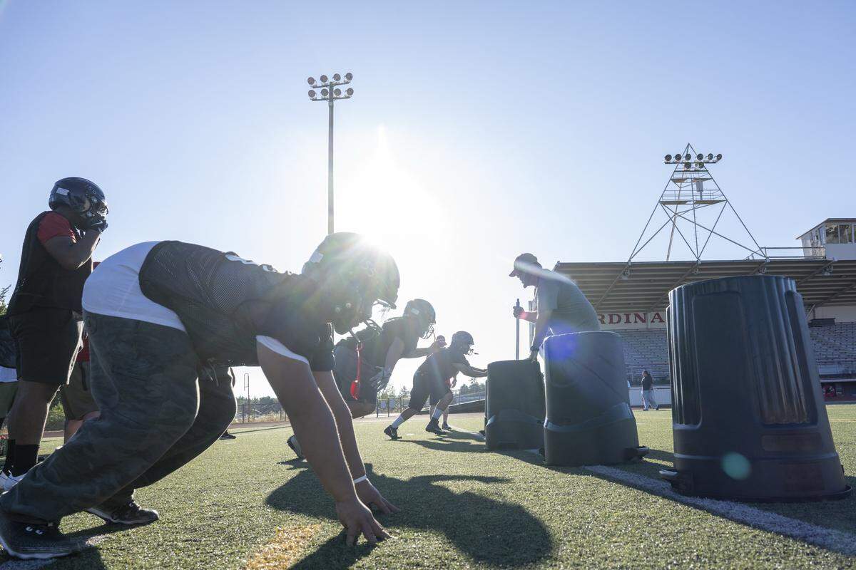 Franklin Pierce defenders run a drill as the team practices on Wednesday, Aug. 20, 2025, in Tacoma, Wash.