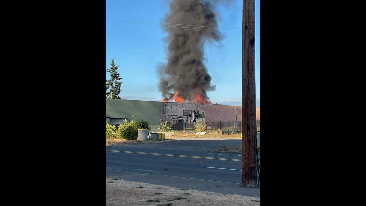 2-alarm commercial fire burning causing closures in Puyallup on Aug. 22, 2023.