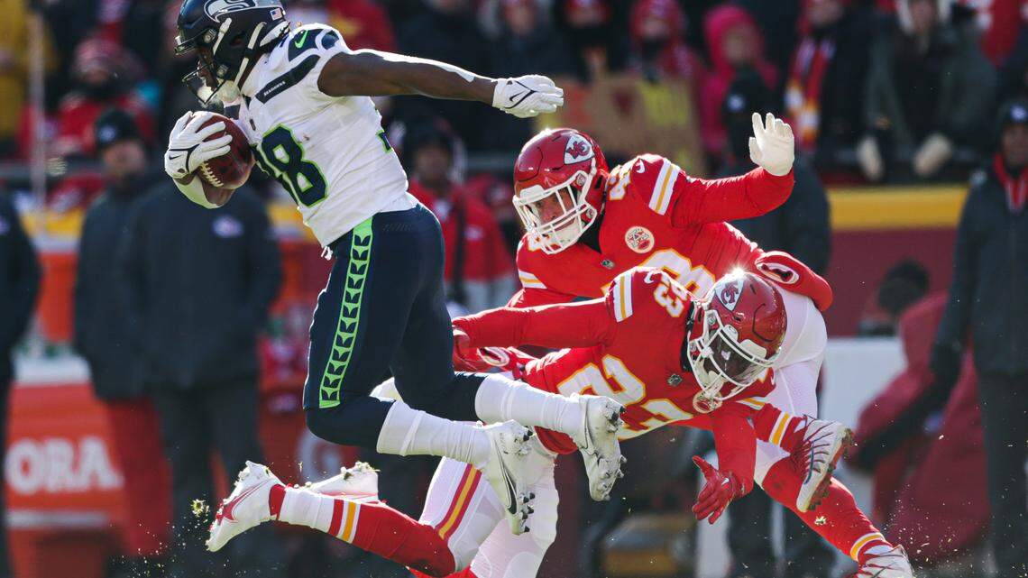 Seattle Seahawks running back Godwin Igwebuike (38) returns a kickoff during the first quarter against the Kansas City Chiefs on Saturday, Dec. 24, 2022, in Kansas City, MO.