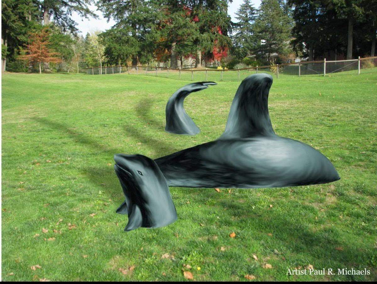 A rendition of a future bronze sculpture installation at Gateway Park off of state Route 302 on the Key Peninsula, featuring a baby orca’s head, an adult orca’s back and dorsal fin, and another adult orca’s tail, from artist Paul R. Michaels.