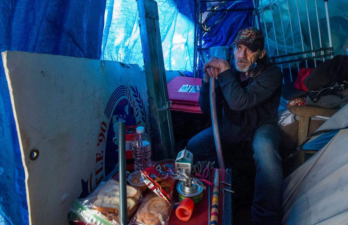 Leaning heavily on a cane, his most prized possession since injuring his neck and spine, Ronald Brenneman, 52, has been living on the streets for the past six years. Since his RV was stolen, he’s pitched his tent where he can, most recently in an encampment on South Sixth Avenue in Tacoma. Brenneman says his health issues prevent him from working but he takes solace in the community of fellow homeless. “I help whoever I can with whatever I have.”