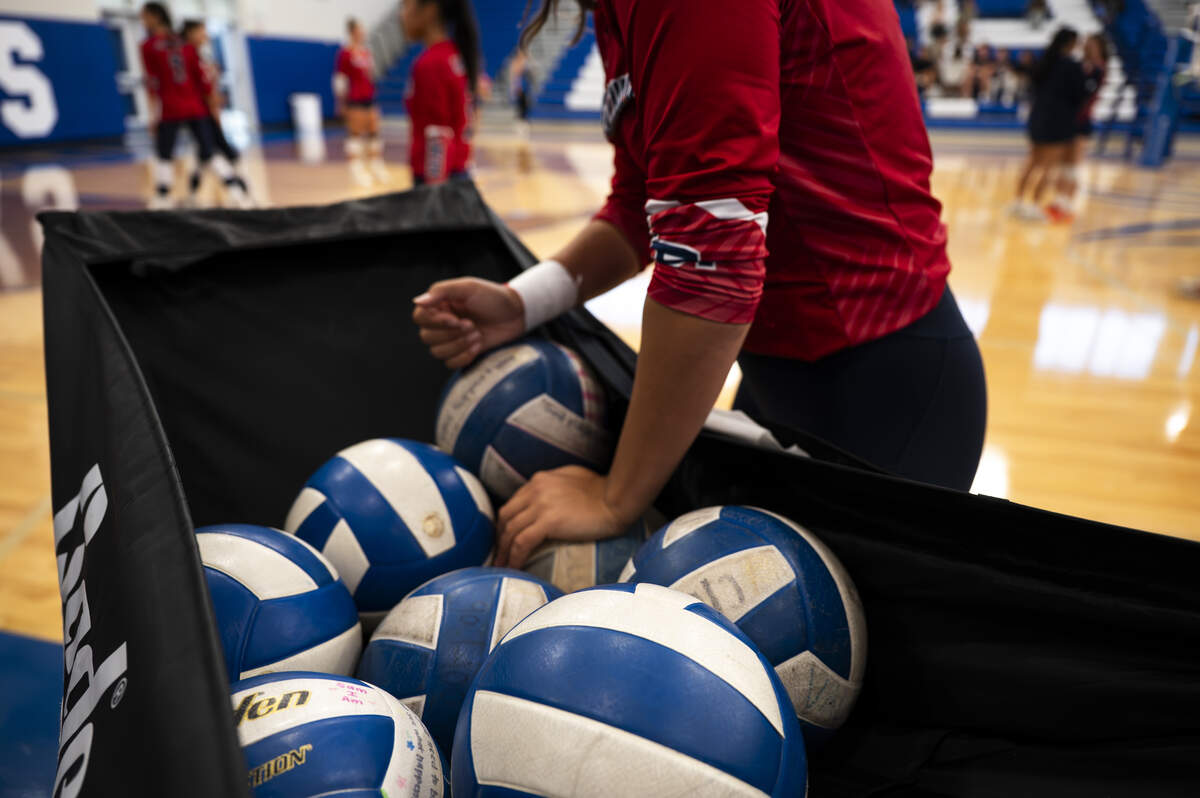 Players warm up before the volleyball match between the Kennedy Catholic Lancers and the Curtis Vikings at Curtis Senior High School, on Thursday, Sept. 18, 2025, in University Place, Wash.