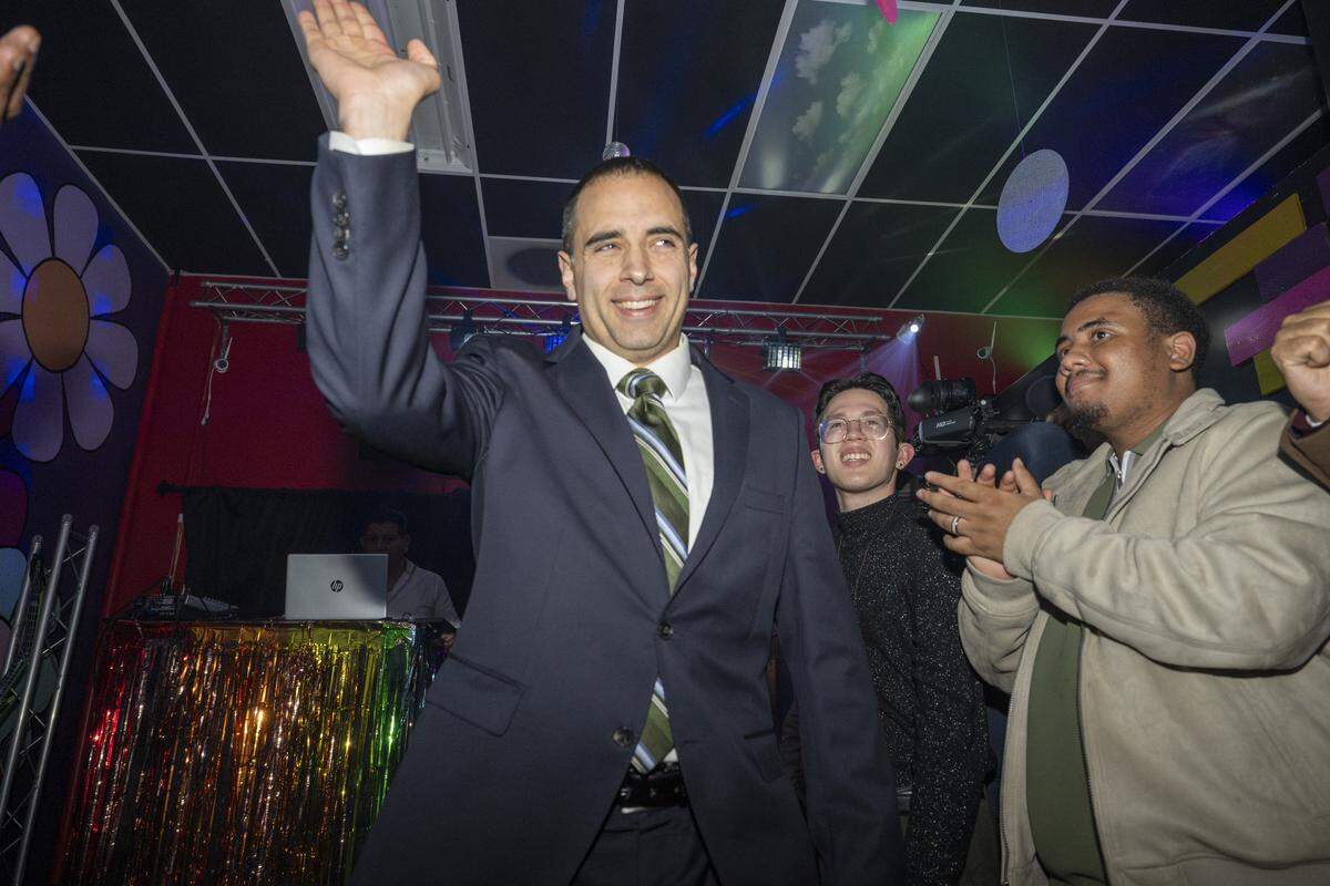 Mayoral candidate Anders Ibsen is cheered on by supporters after giving a speech at an election night watch party on Tuesday, Nov. 4, 2025, in Tacoma, Wash.