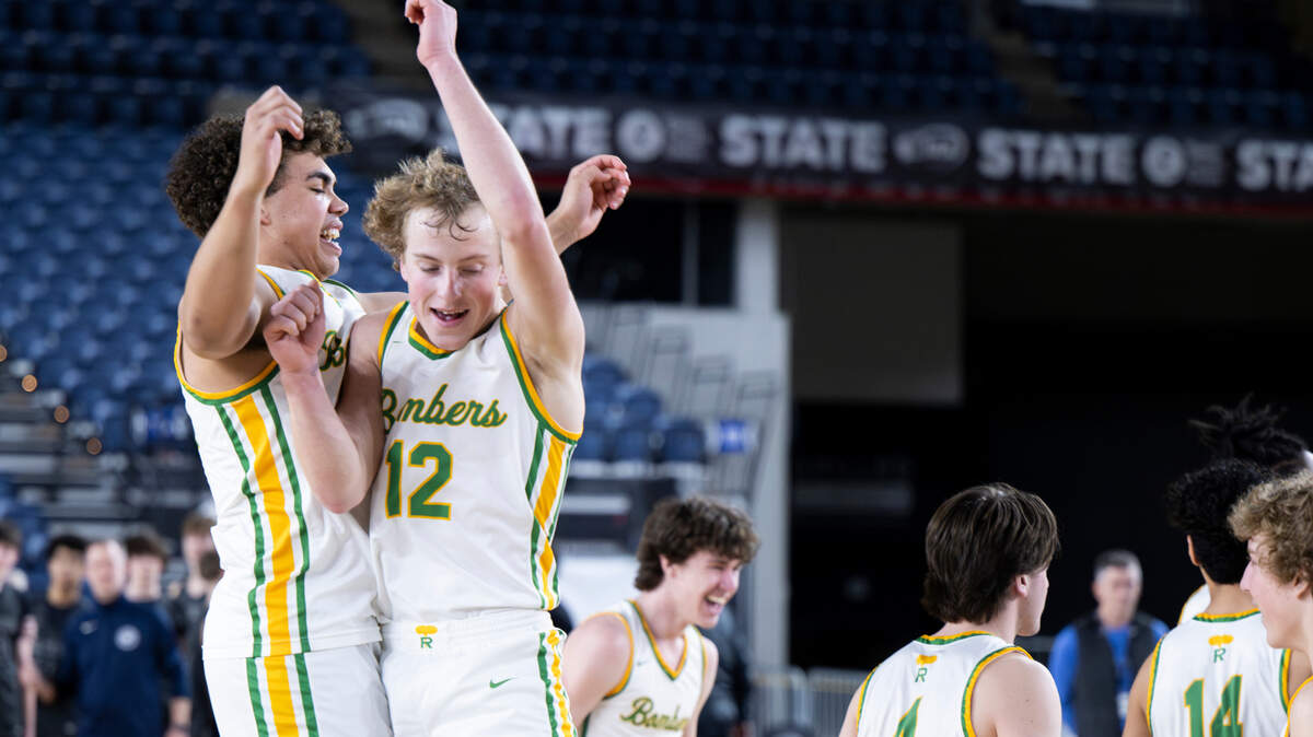 Richland Bombers celebrate advancing to the 4A championship over Glacier Peak during the semifinals game of the Class 4A state tournament at the Tacoma Dome, on Friday, March 1, 2024, in Tacoma, Wash.
