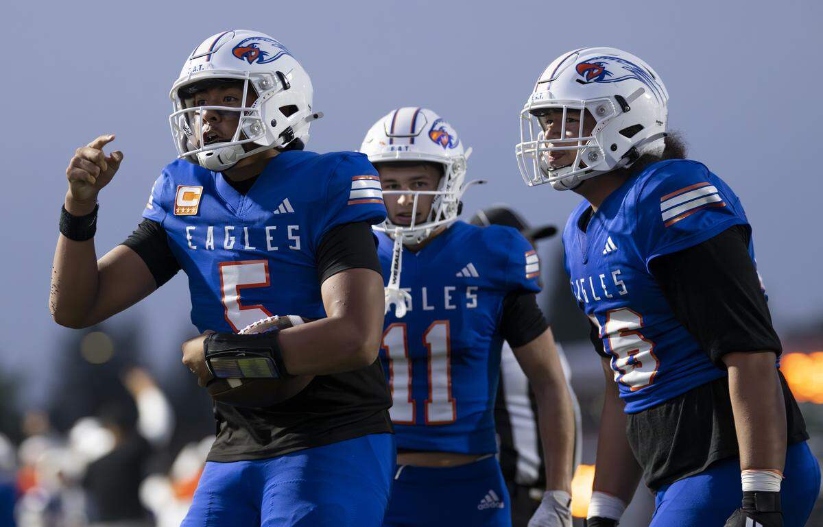 Graham-Kapowsin Eagles quarterback AJ Tuivaiave (5) reacts to a play against the O'Dea Fighting Irish during the first half of the game at Art Crate Field, on Friday, Sept. 5, 2025, in Spanaway, Wash.